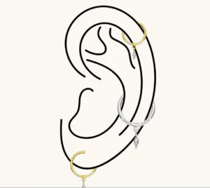 Ανακάλυψε το ασημί Clicker Piercing με κρεμαστό δάκρυ και λαμπερά λευκά zircon από χειρουργικό ατσάλι. Κομψό, υποαλλεργικό και ανθεκτικό, ιδανικό για αυτί ή μύτη. Δώσε λάμψη στο στυλ σου με το μοναδικό piercing από το Stylehub!